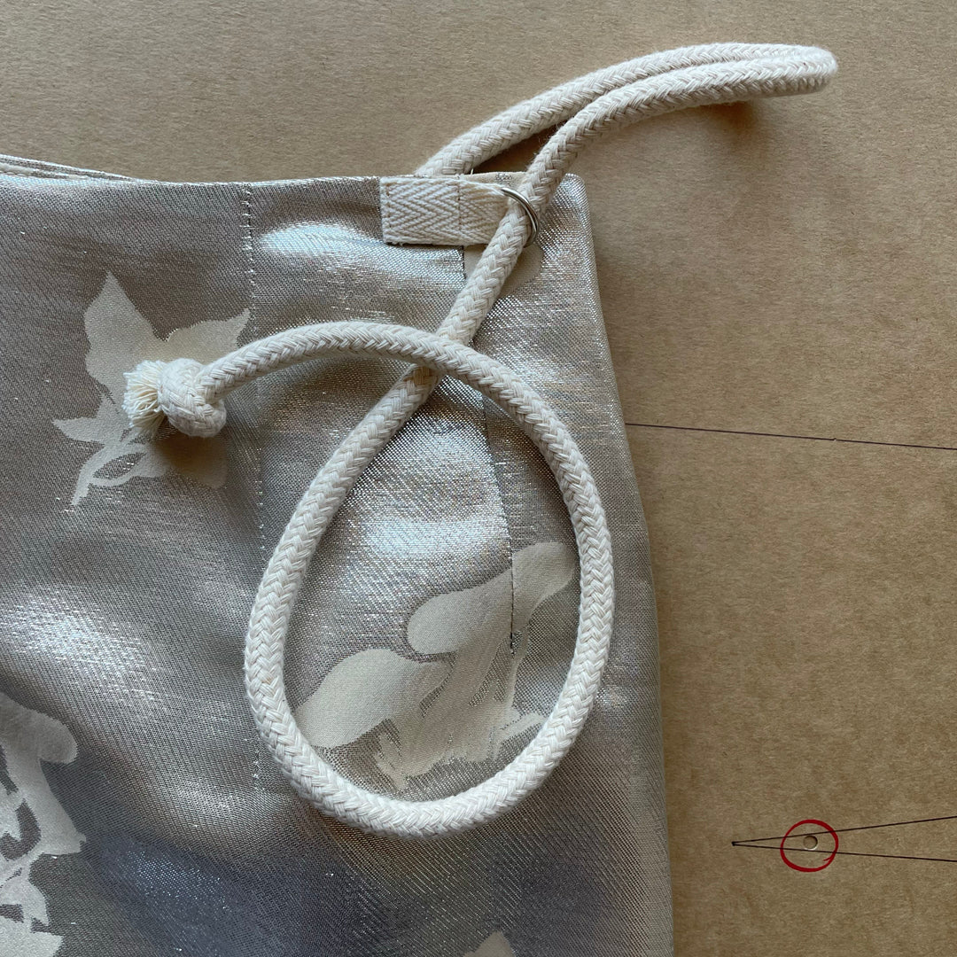 silk wrap skirt D ring rope closure close up detail back